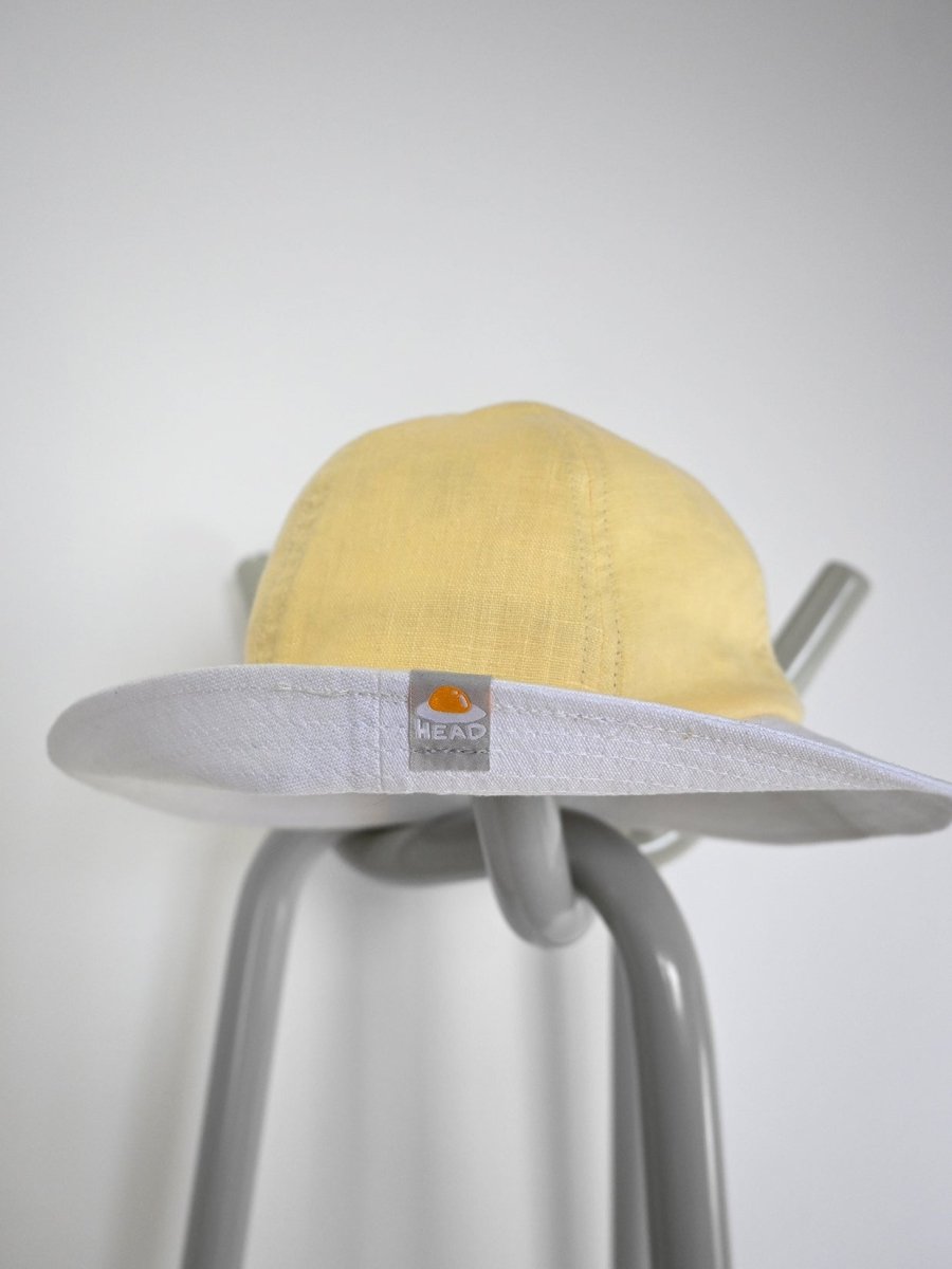 "Egghead" Linen bucket hat. Design by HO HOS HOLE IN THE WALL 🐜 Made in NYC